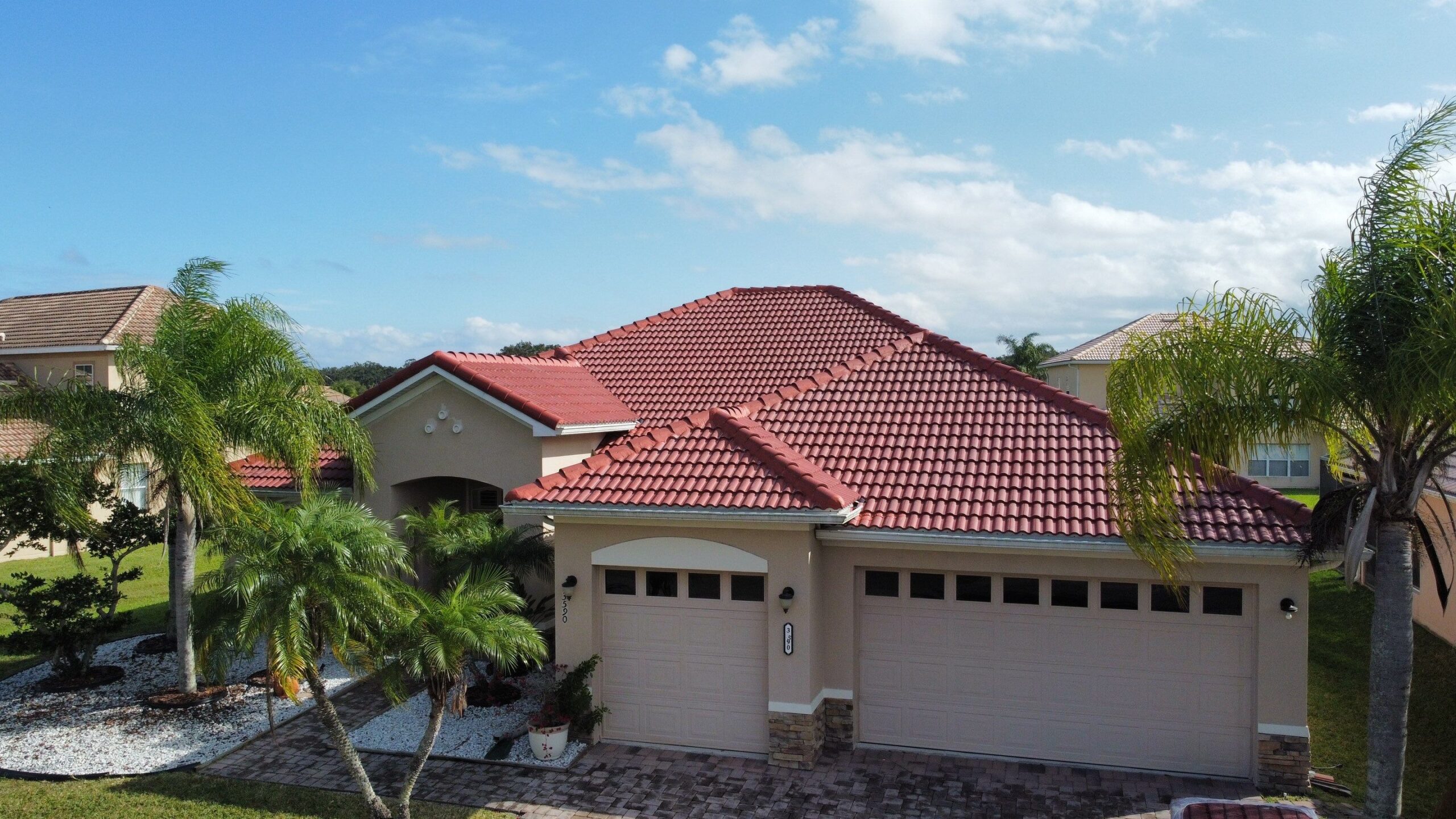 Curbside view of a home with new tile roofing in Greater Orlando, FL